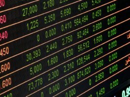 Detailed view of a stock market screen showing numbers and data, symbolizing financial trading.