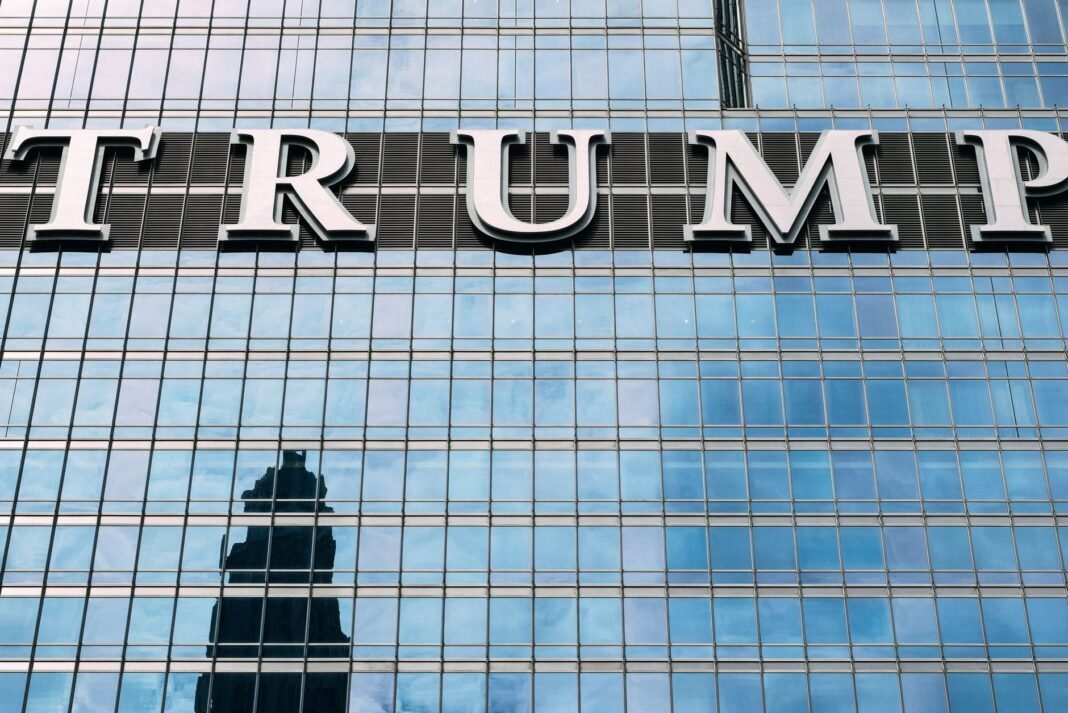 Senator Curtis demands Senate probe into Trump Jr’s ties to Russian oligarch Umar Kremlev Close-up of Trump Tower's glass facade with the city skyline reflection in the windows.